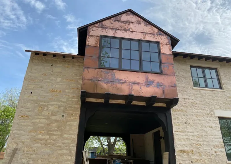 Copper metal panel facade on a stone building for Metal Roof Coating in Deerpark